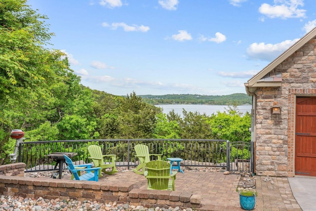 46 Wild Rose Ln, Lampe, MO 65681 - view of patio / terrace featuring a water view