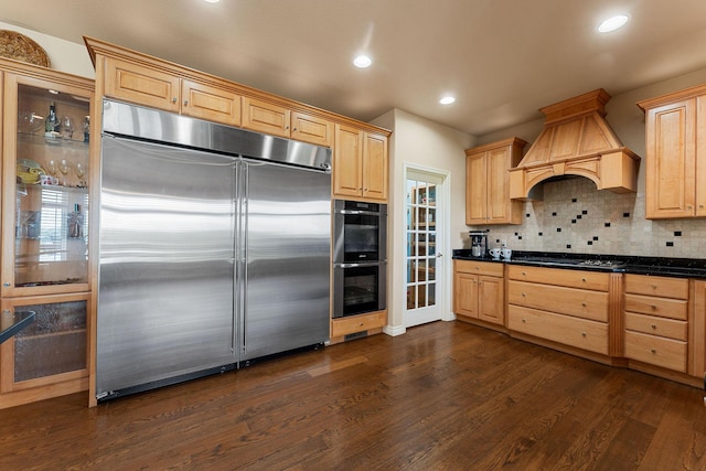 46 Wild Rose Ln, Lampe, MO 65681 - kitchen featuring dark wood-style flooring, stainless steel appliances, light brown cabinets, tasteful backsplash, and custom exhaust hood