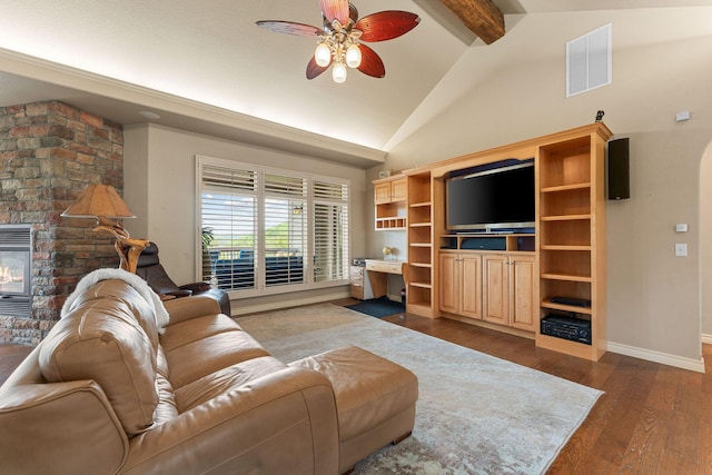 46 Wild Rose Ln, Lampe, MO 65681 - living room featuring beamed ceiling, baseboards, visible vents, a ceiling fan, and dark wood-type flooring