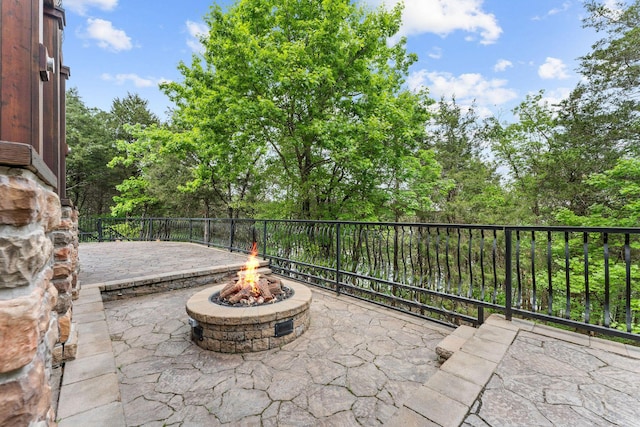 46 Wild Rose Ln, Lampe, MO 65681 - view of patio / terrace featuring a fire pit