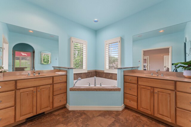 46 Wild Rose Ln, Lampe, MO 65681 - bathroom with visible vents, two vanities, and a sink
