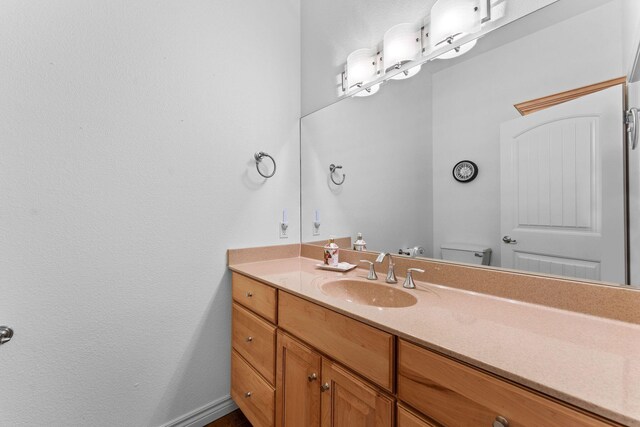 46 Wild Rose Ln, Lampe, MO 65681 - half bathroom featuring toilet and vanity