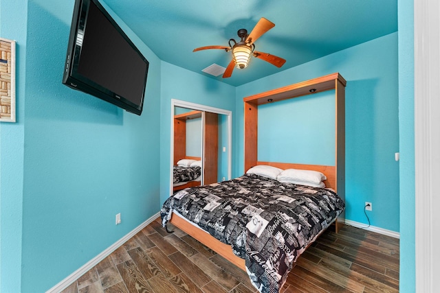 46 Wild Rose Ln, Lampe, MO 65681 - bedroom with baseboards, visible vents, a ceiling fan, and dark wood-style flooring