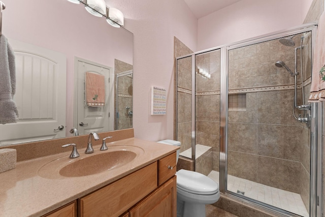 46 Wild Rose Ln, Lampe, MO 65681 - full bathroom featuring a shower stall, toilet, and vanity