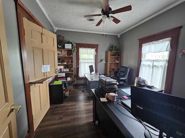 office area with a textured ceiling, crown molding, visible vents, ceiling fan, and dark wood-type flooring