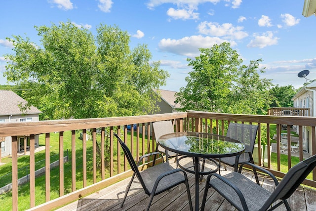 520 Abby Ln Unit 8, Branson, MO 65616 - deck featuring outdoor dining space and a yard