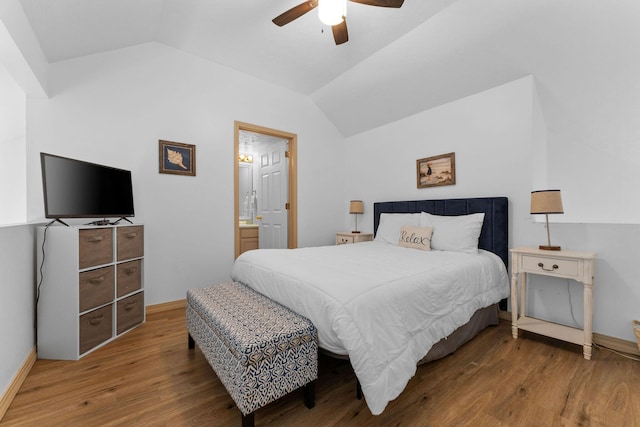 520 Abby Ln Unit 8, Branson, MO 65616 - bedroom featuring vaulted ceiling, wood finished floors, baseboards, ceiling fan, and ensuite bathroom