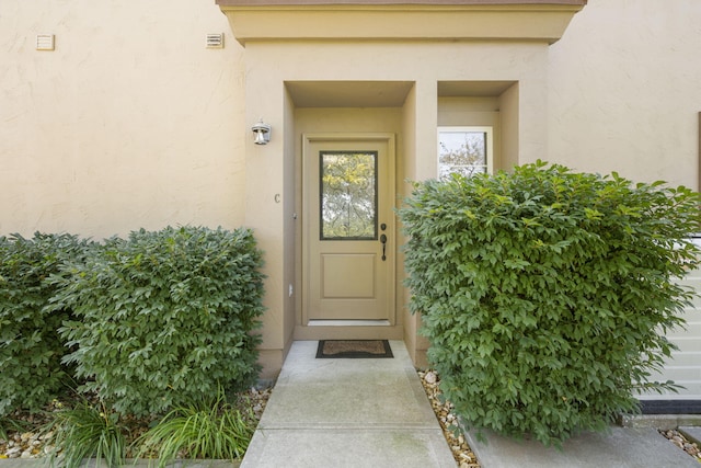 140 S Tuscany Dr Unit C, Hollister, MO 65672 - entrance to property featuring stucco siding