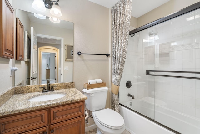 140 S Tuscany Dr Unit C, Hollister, MO 65672 - full bathroom featuring bath / shower combo with glass door, vanity, and toilet
