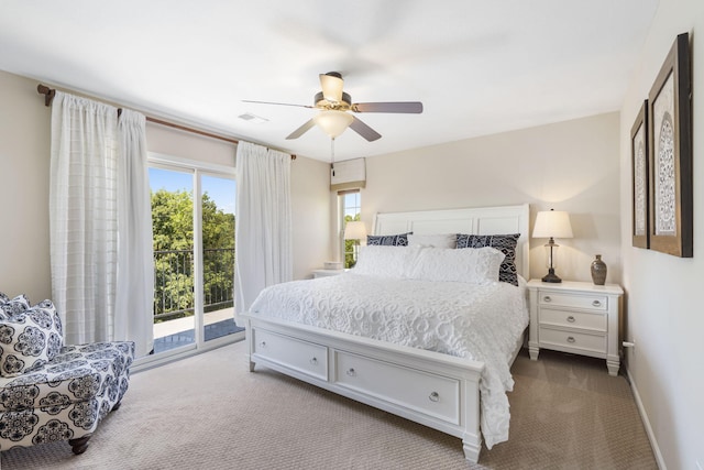 140 S Tuscany Dr Unit C, Hollister, MO 65672 - carpeted bedroom featuring baseboards, visible vents, a ceiling fan, and access to outside