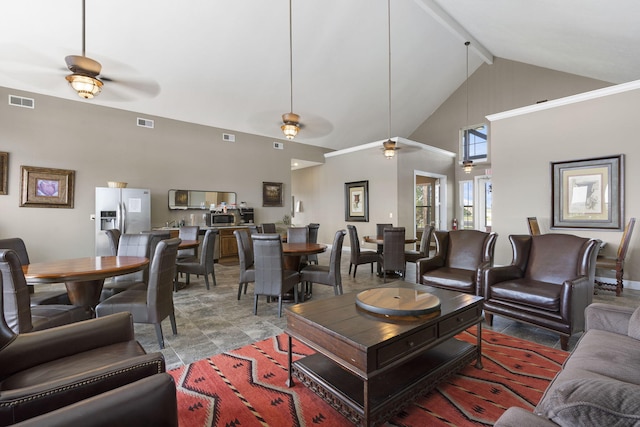 140 S Tuscany Dr Unit C, Hollister, MO 65672 - living room with visible vents, a ceiling fan, high vaulted ceiling, and beamed ceiling