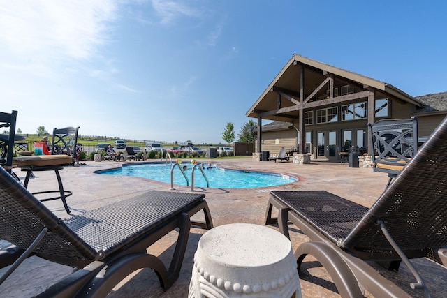 140 S Tuscany Dr Unit C, Hollister, MO 65672 - community pool with fence, french doors, and a patio area