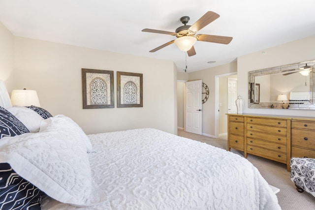 140 S Tuscany Dr Unit C, Hollister, MO 65672 - bedroom with carpet, a ceiling fan, and baseboards