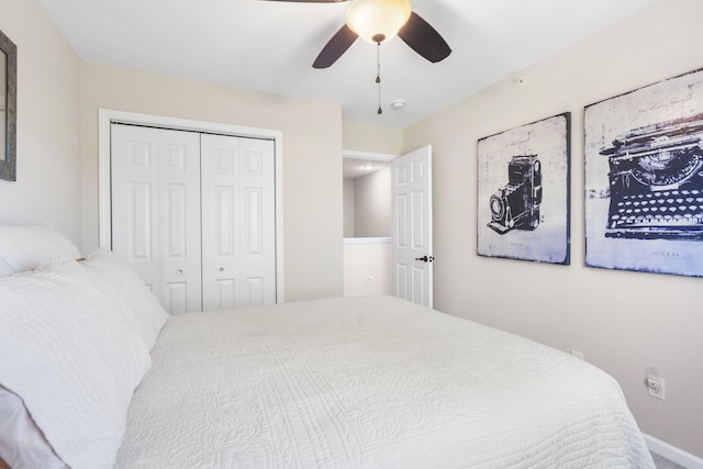 140 S Tuscany Dr Unit C, Hollister, MO 65672 - bedroom with a ceiling fan, baseboards, and a closet