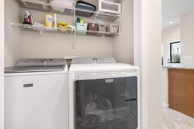140 S Tuscany Dr Unit C, Hollister, MO 65672 - laundry room featuring separate washer and dryer and laundry area