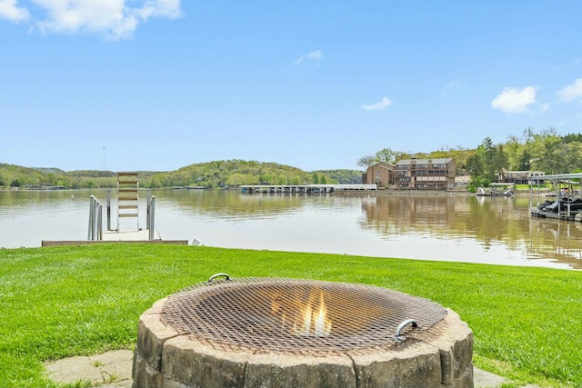 water view with a fire pit