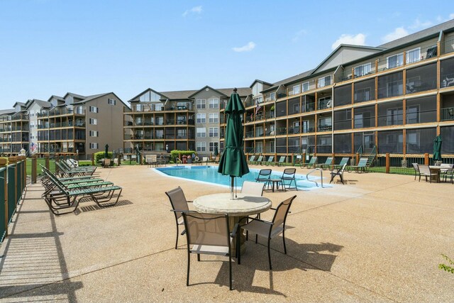 community pool featuring a patio