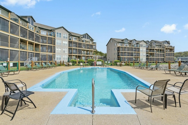 community pool with a patio
