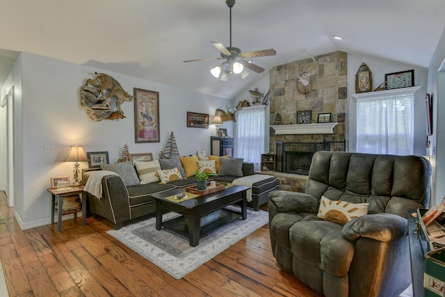 301 Oakview Dr, Ridgedale, MO 65739 - living area featuring wood finished floors, ceiling fan, a fireplace, and lofted ceiling