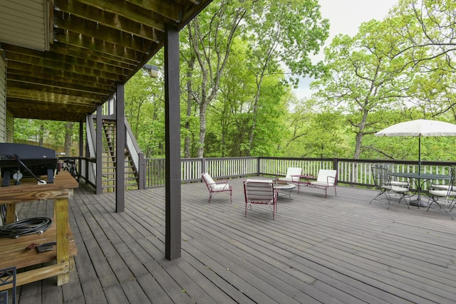 301 Oakview Dr, Ridgedale, MO 65739 - wooden deck featuring a grill, stairway, and outdoor dining area