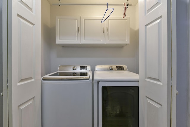 301 Oakview Dr, Ridgedale, MO 65739 - washroom featuring cabinet space and washer and clothes dryer