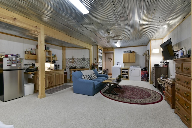 301 Oakview Dr, Ridgedale, MO 65739 - living room with ceiling fan, separate washer and dryer, and carpet floors