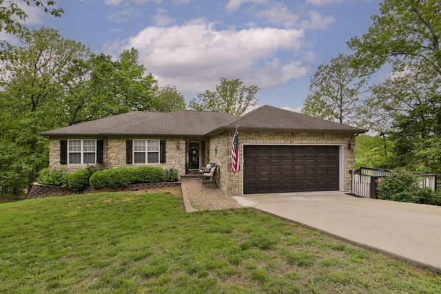 301 Oakview Dr, Ridgedale, MO 65739 - ranch-style house with concrete driveway, stone siding, roof with shingles, a front yard, and a garage
