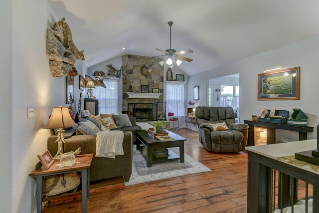301 Oakview Dr, Ridgedale, MO 65739 - living area with a fireplace, wood finished floors, ceiling fan, and vaulted ceiling