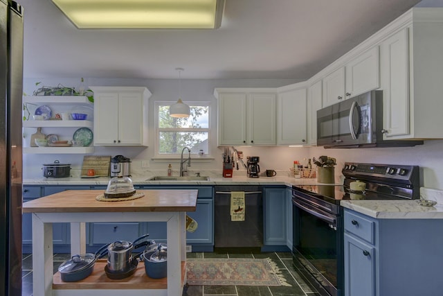 301 Oakview Dr, Ridgedale, MO 65739 - kitchen featuring a sink, white cabinets, blue cabinets, and stainless steel appliances