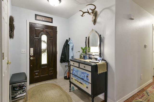 301 Oakview Dr, Ridgedale, MO 65739 - entryway with light tile patterned floors and baseboards