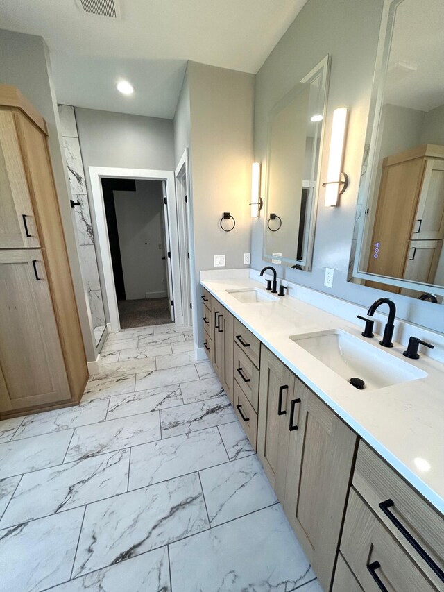 5958 S Clay Ave, Springfield, MO 65810 - full bath with marble finish floors, a shower stall, double vanity, and recessed lighting