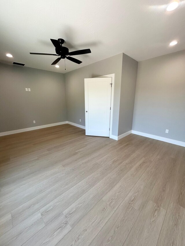 5958 S Clay Ave, Springfield, MO 65810 - spare room featuring baseboards, ceiling fan, light wood finished floors, and recessed lighting