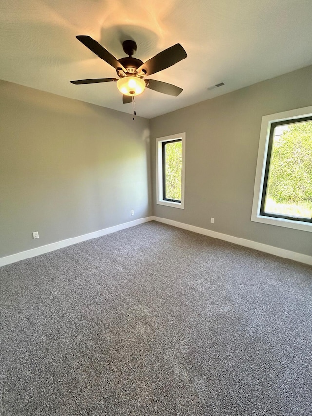 5958 S Clay Ave, Springfield, MO 65810 - empty room featuring baseboards, ceiling fan, and carpet