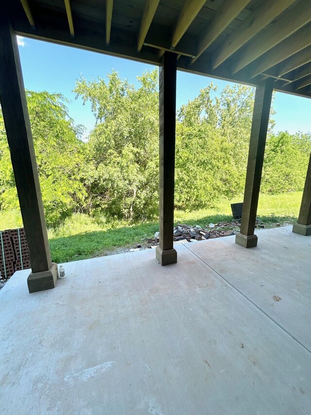 5958 S Clay Ave, Springfield, MO 65810 - view of patio with a wooded view