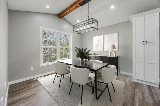 dining space with lofted ceiling with beams, recessed lighting, and baseboards