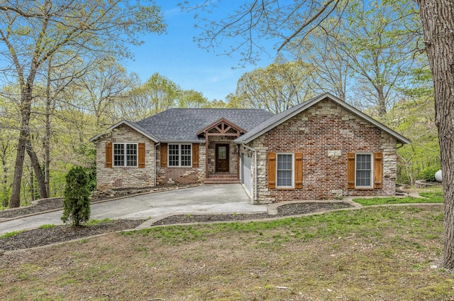 single story home featuring brick siding, a shingled roof, a garage, driveway, and stone siding