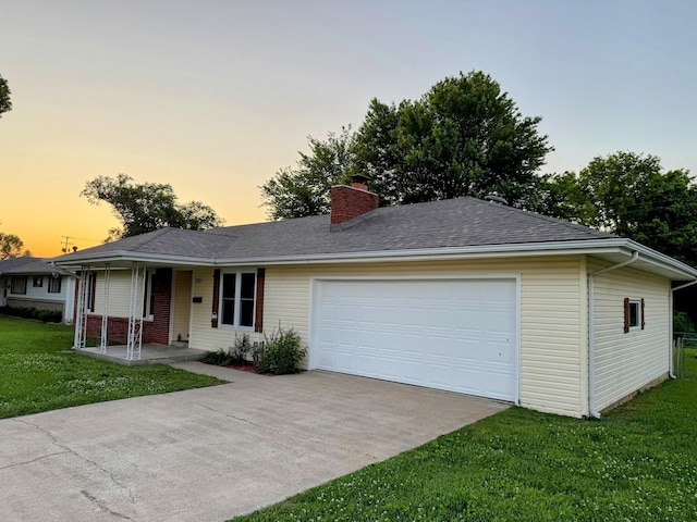 213 W Charles St, Republic, MO 65738 - ranch-style home featuring a chimney, concrete driveway, a porch, an attached garage, and a lawn