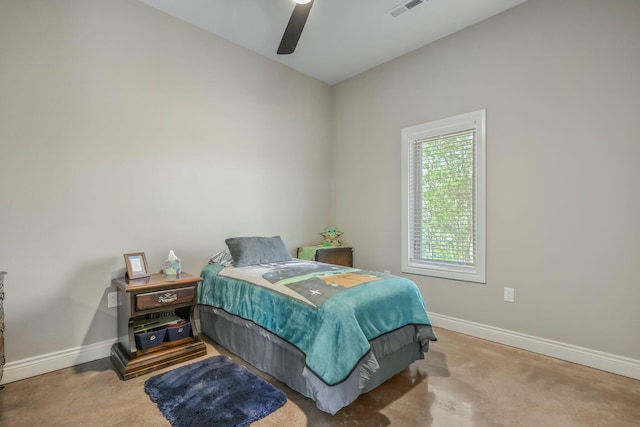 bedroom featuring visible vents, a ceiling fan, and baseboards