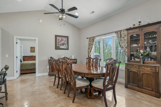 dining room featuring a ceiling fan, visible vents, and high vaulted ceiling