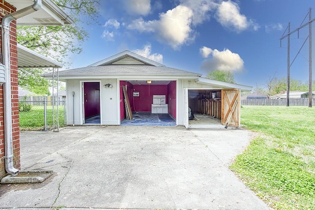 garage featuring fence
