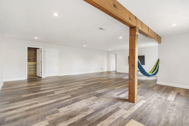 below grade area with baseboards, recessed lighting, and wood finished floors