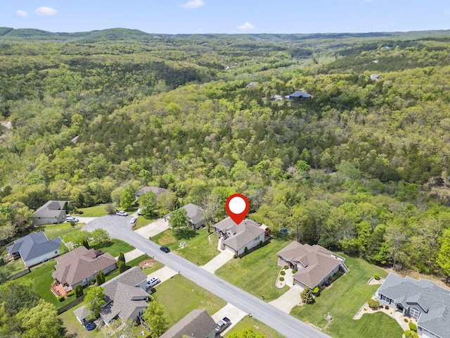 aerial view featuring a residential view and a forest view