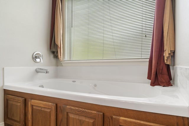 bathroom featuring a garden tub