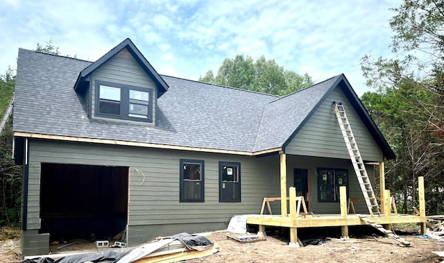 447 S Heatherwood Rd, Shell Knob, MO 65747 - view of front facade featuring a shingled roof and a deck