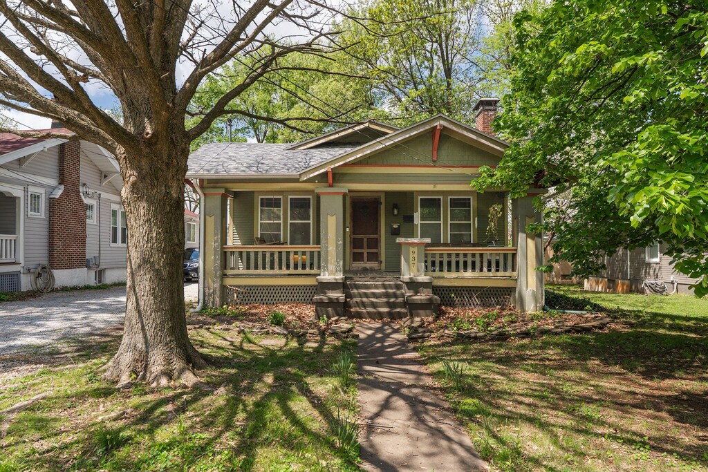 937 S Fremont Ave, Springfield, MO 65804 - view of front of house with covered porch and a chimney
