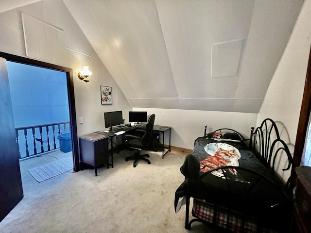 office area with lofted ceiling and carpet floors
