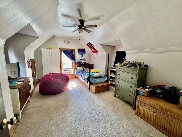 bedroom with ceiling fan, light carpet, and lofted ceiling