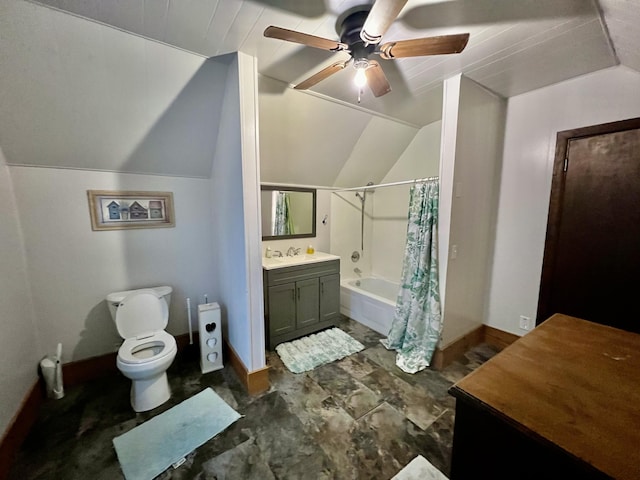 full bath featuring toilet, a ceiling fan, vaulted ceiling, and baseboards
