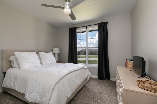 2460 S Durango Dr, Bolivar, MO 65613 - bedroom featuring ceiling fan, light carpet, and baseboards