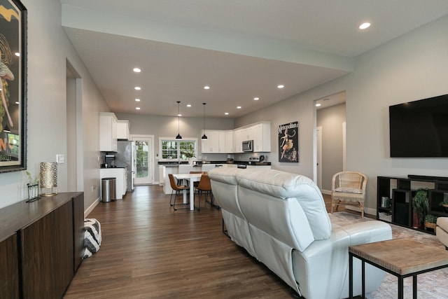 2460 S Durango Dr, Bolivar, MO 65613 - living area with recessed lighting, dark wood-style flooring, and baseboards